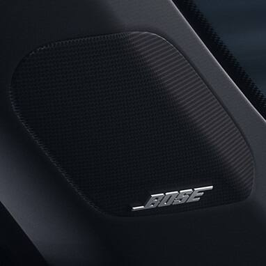 2027 Honda Civic Hatchback Sport Touring Hybrid detail of the Bose premium sound system speakers (Compact Hatchback).
