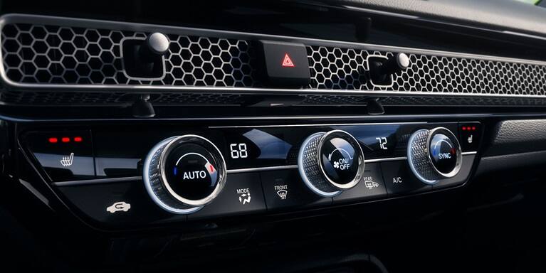 2027 Honda Civic Hatchback Sport Touring Hybrid dual-zone automatic climate control and honeycomb vents (Compact Hatchback).